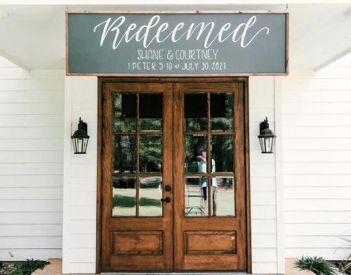 Hand-lettered wedding and Bible verse sign from Audrey by Design