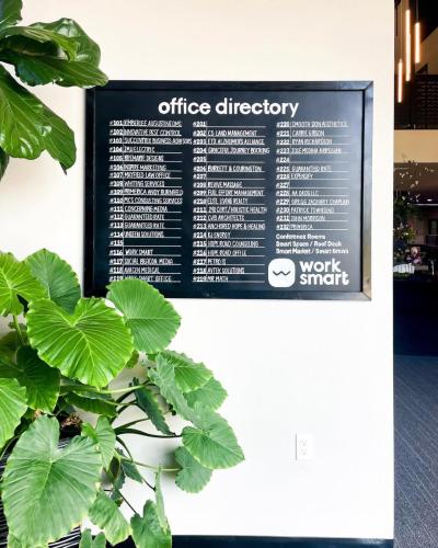 Hand-lettered office directory board from Audrey by Design